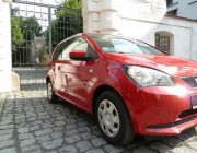 red small car VW Up!